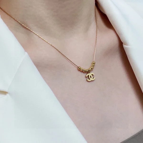 Replica Chanel necklace 8 gold-plated beads gold CC style pendant